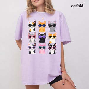 Colorful cat graphic tee for women and cat enthusiasts.