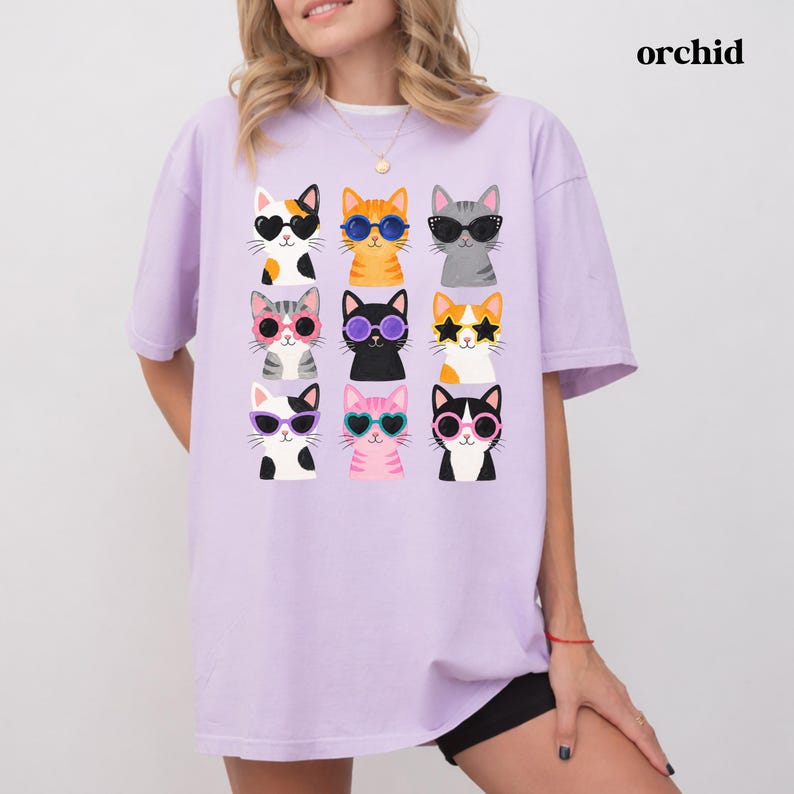 Colorful cat graphic tee for women and cat enthusiasts.