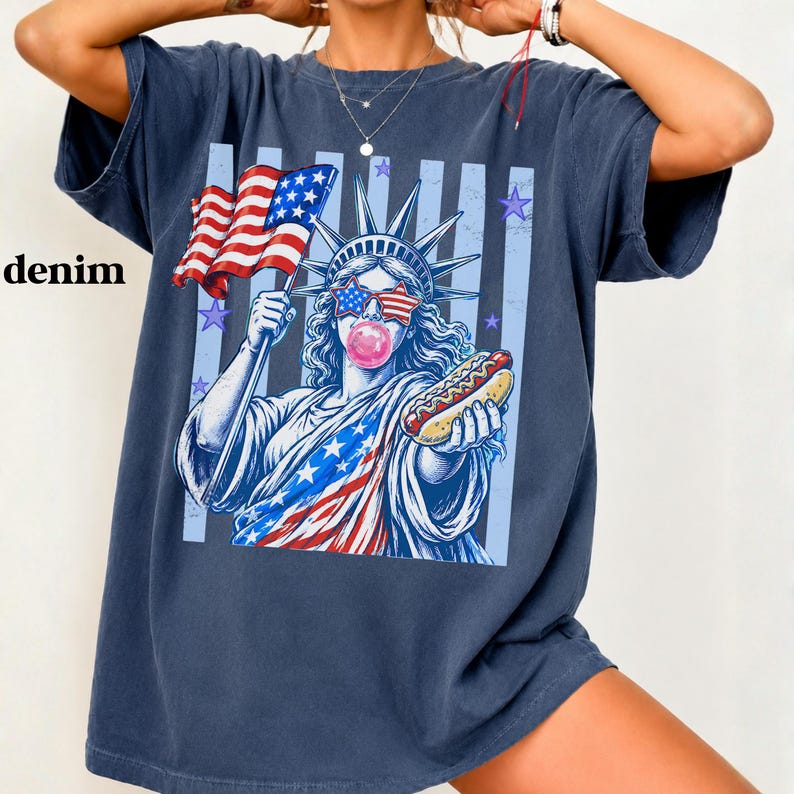 Statue of Liberty bubble gum hot dog shirt with patriotic USA 250 design.