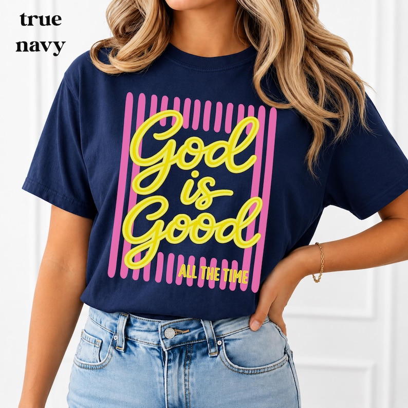 Yellow God Is Good Christian graphic on Comfort Colors® shirt.