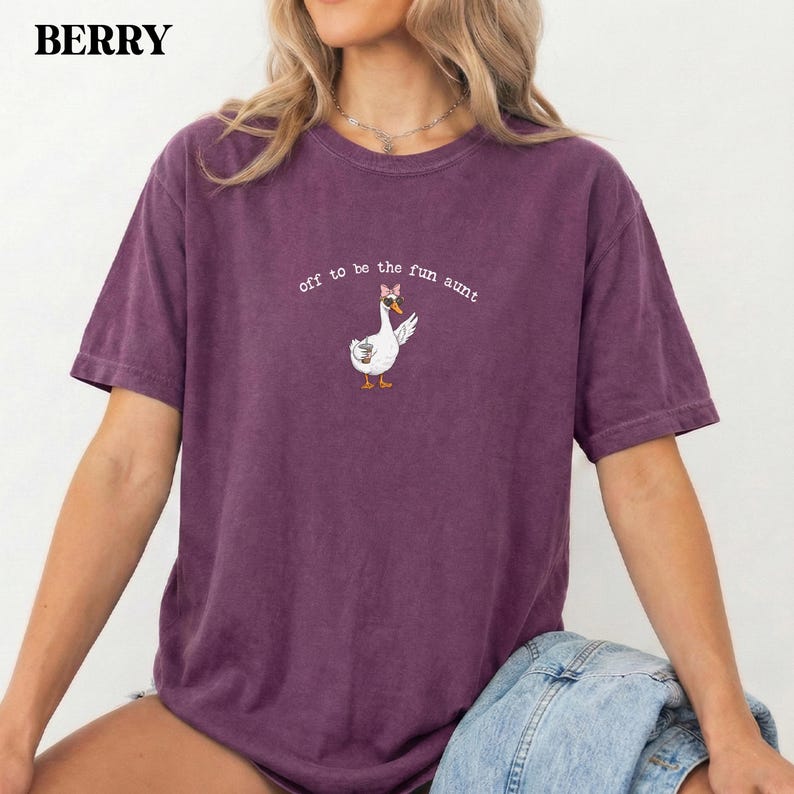 Funny goose character illustration with accessories printed on aunt themed apparel.