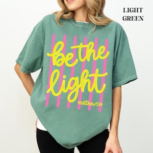 Be the Light oversized Christian shirt for women and teens.