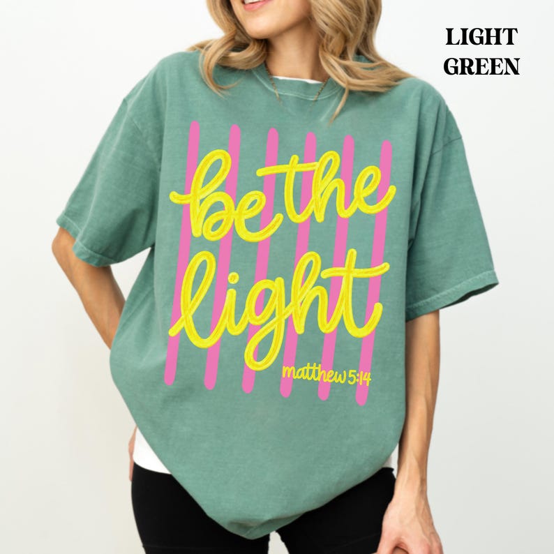 Be the Light oversized Christian shirt for women and teens.