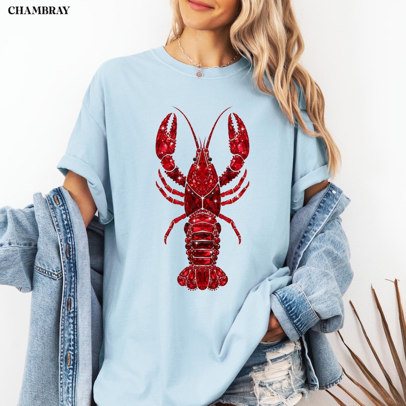 lobster graphic shirt with sparkle effect design on green tee