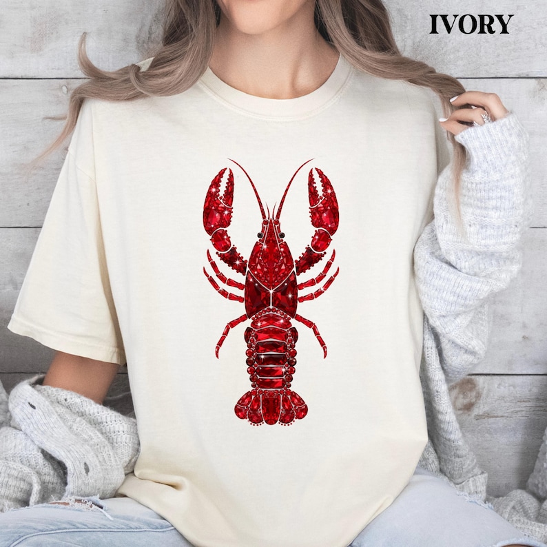 moss green shirt with red lobster design styled in casual outfit