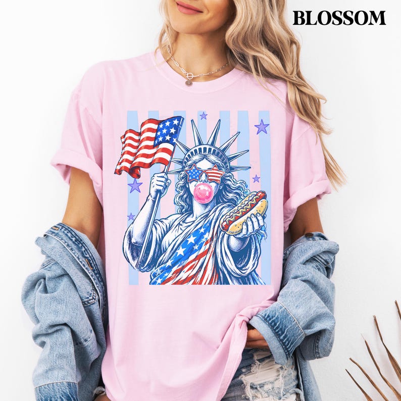 Comfort Colors patriotic shirt with retro America 250 Statue of Liberty artwork.
