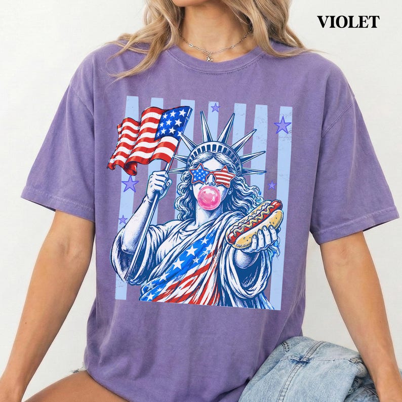 Preppy patriotic shirt with bubble gum Statue of Liberty and red white blue details.