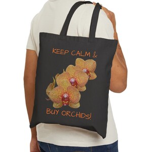 Phalaenopsis Orchid Designer Black Cotton Canvas Tote Bag. Unique, versatile, and durable, the perfect companion for your next Orchid Show!
