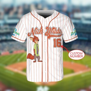 May include: White baseball jersey with red pinstripes, featuring the name "Nick Wilde" in orange script and the number "16". A cartoon fox character is on the front. The jersey has a button-up front and short sleeves.