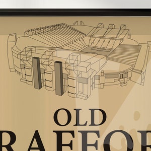 May include: A black and white line drawing of Old Trafford, a famous soccer stadium in Manchester, England. The drawing is on a beige background with the words "Old Trafford" printed below the stadium.