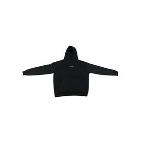 May include: Black hoodie with a hood and a front pocket. The hoodie has long sleeves and a small logo on the left sleeve. A small white text is printed on the chest. The hoodie is spread out on a white background.