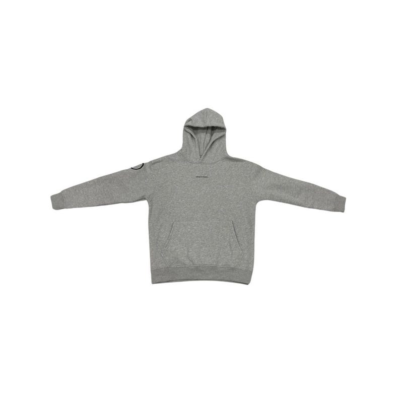 May include: A heather gray hoodie with a hood and a front pocket. The hoodie has long sleeves and a small circular design on the left sleeve. The text "MADE IN ITALY" is printed on the front of the hoodie.