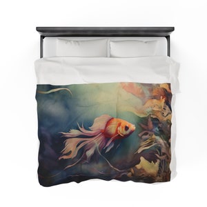 May include: A watercolor painting of a single orange and white goldfish swimming in a blue and green underwater scene. The fish has long flowing fins and is surrounded by seaweed.