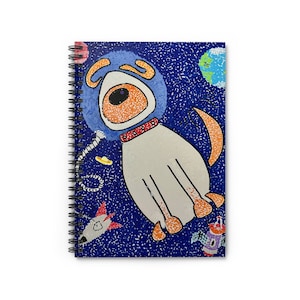 May include: A white dog wearing a blue astronaut helmet floats in space. The dog is surrounded by stars, planets, and a rocket ship. The background is a dark blue with white dots.