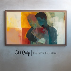 May include: Abstract painting of two figures in a warm color palette, with shades of yellow, orange, red, and blue. The painting is framed in a brown wood frame. The text "Ed & Dustys | Digital TV Collection" is below the painting.