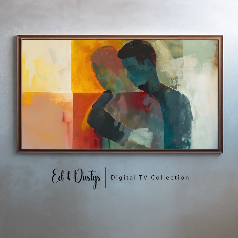 May include: Abstract painting of two figures in a warm color palette, with shades of yellow, orange, red, and blue. The painting is framed in a brown wood frame. The text "Ed & Dustys | Digital TV Collection" is below the painting.