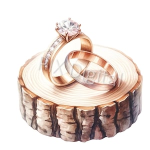 Peut inclure: Deux alliances en or avec une grande bague en diamant sur une tranche de bois de rondin. La bague en diamant est de taille ronde et est sertie dans une bande d'or avec de plus petits diamants sur la bande.