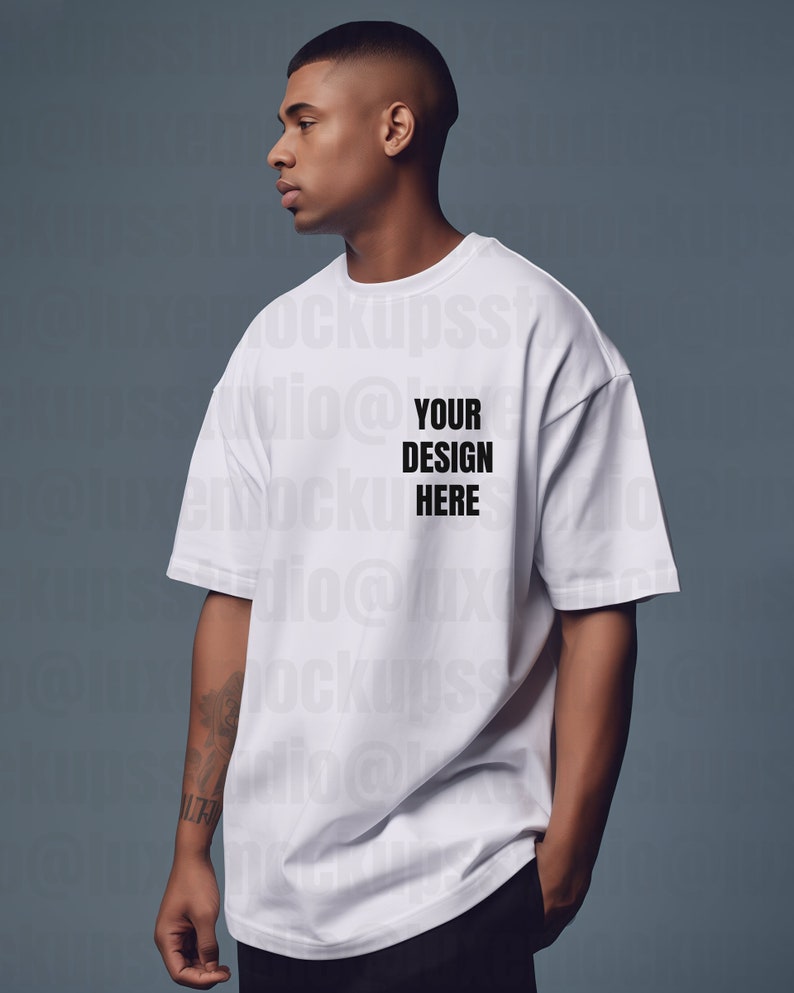 luxury streetwear photo mockup of male standing at angle in white oversized t shirt