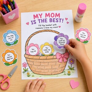 Könnte beinhalten: Ein Bastelaktivitätsblatt mit dem Text "MY MOM IS THE BEST!" und einer Korbbildillustration. Blumenförmige Ausschnitte mit Sätzen wie "You cook my favorite food" werden in den Korb gelegt. Eine rosa Klebstoffflasche und Buntstifte sind ebenfalls vorhanden.