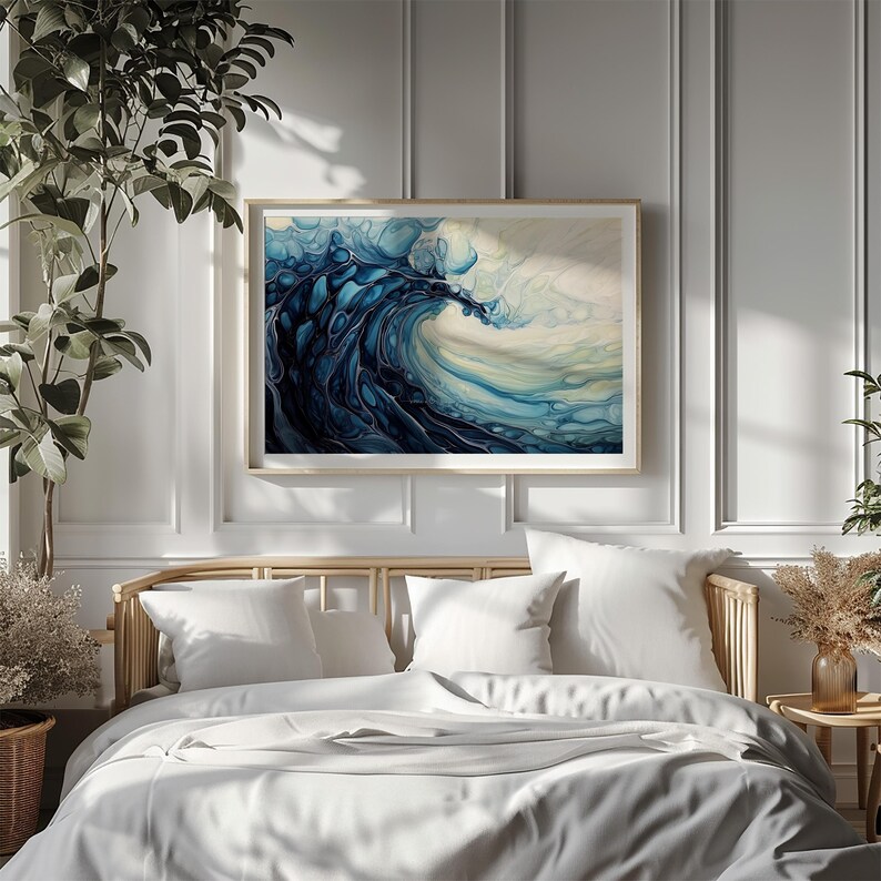 a bed with white sheets and a painting on the wall