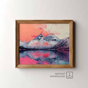 May include: A digital art print of a mountain range reflected in a still lake. The mountains are a light blue and white, with a pink and orange sky behind them. The lake is a dark blue, with a pink and orange reflection of the sky.
