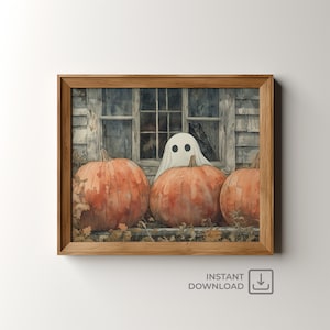Könnte beinhalten: Ein Aquarellbild eines Geistes, der hinter drei Kürbissen auf einer Veranda hervorlugt. Die Kürbisse sind orange und der Geist ist weiß mit zwei schwarzen Augen. Der Hintergrund ist ein rustikales Holzhaus mit einem Fenster.