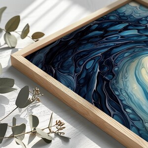a picture of a blue and white art work
