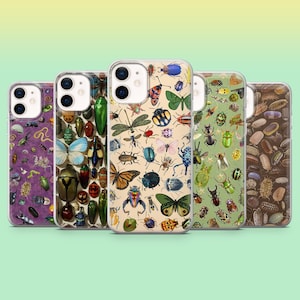 May include: Five phone cases with insect designs. The cases feature various insects, including butterflies, beetles, and dragonflies, in a variety of colors. The backgrounds of the cases are different colors, including purple, beige, and green.