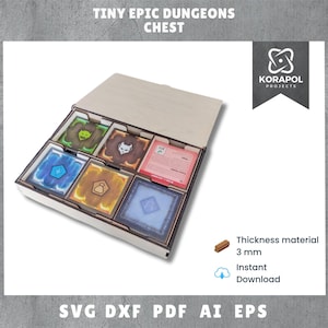 May include: A wooden box with a lid open, revealing a custom insert for organizing game components. The insert has six compartments, each with a different colored card. The box is labeled "Tiny Epic Dungeons Chest".