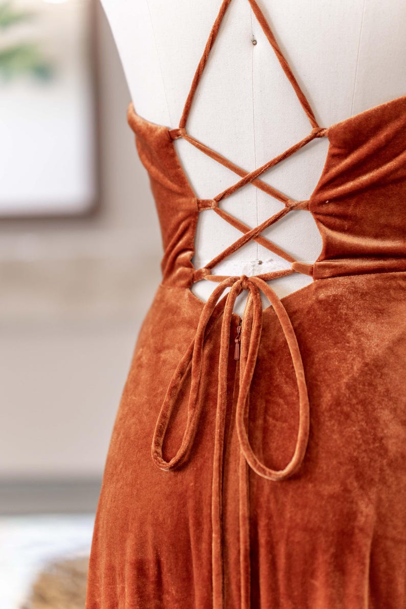 a dress on a mannequin with an open back