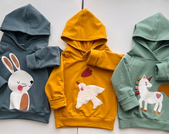 Mädchen /Jungen  Hoodie,Sweater oversize  in  Pastell Türkis,blau ,Ocker gelb .Applikation Unicorn,Vogel ,Hase Ostern Geburtstag  Geschenk