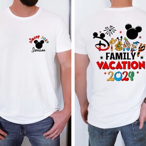 a man wearing a mickey mouse family vacation shirt