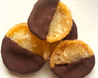 Chocoladecitroenen, in chocolade gedoopte gekonfijte citroenschijfjes: biologische veganistische traktatie
