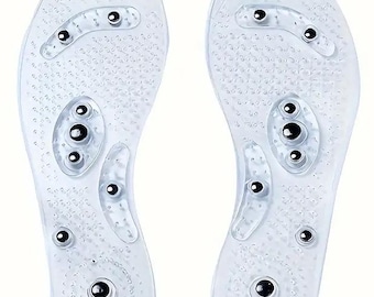 Puede incluir: Un par de plantillas de masaje para los pies de plástico transparente con protuberancias elevadas y bolas de metal plateadas. Las plantillas están diseñadas para estimular los pies y mejorar la circulación.