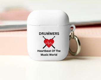 May include: White Airpods case with a black and red graphic that says "Drummers Heartbeat Of The Music World". The graphic includes a red heart with a heartbeat line and two drumsticks crossed over the heart.