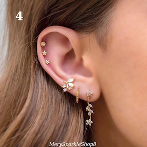 Parure de boucles d'oreilles étoile et fleur en or • Boucles d'oreilles pendantes diamant, clous d'oreilles et bague Huggie avec breloque • Ensemble cadeau créoles Huggie délicats