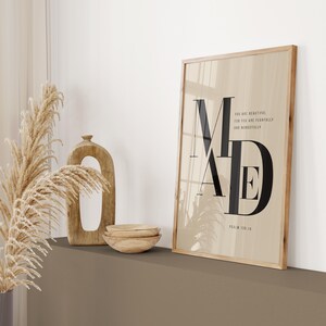 Beige and black bold MADE Psalm 139:14 scripture print in wooden frame leaning on shelf with pampas grass and wooden arch vase, minimalist Christian wall art instant download
