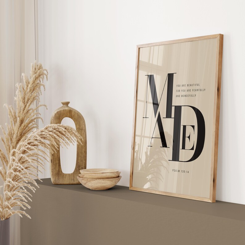 Beige and black bold MADE Psalm 139:14 scripture print in wooden frame leaning on shelf with pampas grass and wooden arch vase, minimalist Christian wall art instant download