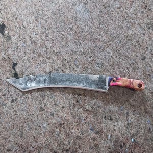 13" hand forged "Zombie Slayer" survival knife with hand tooled and dyed leather sheath.