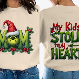 Grinch-kerstsweater: kerstmuts grafisch, gezellige vakantiestijl