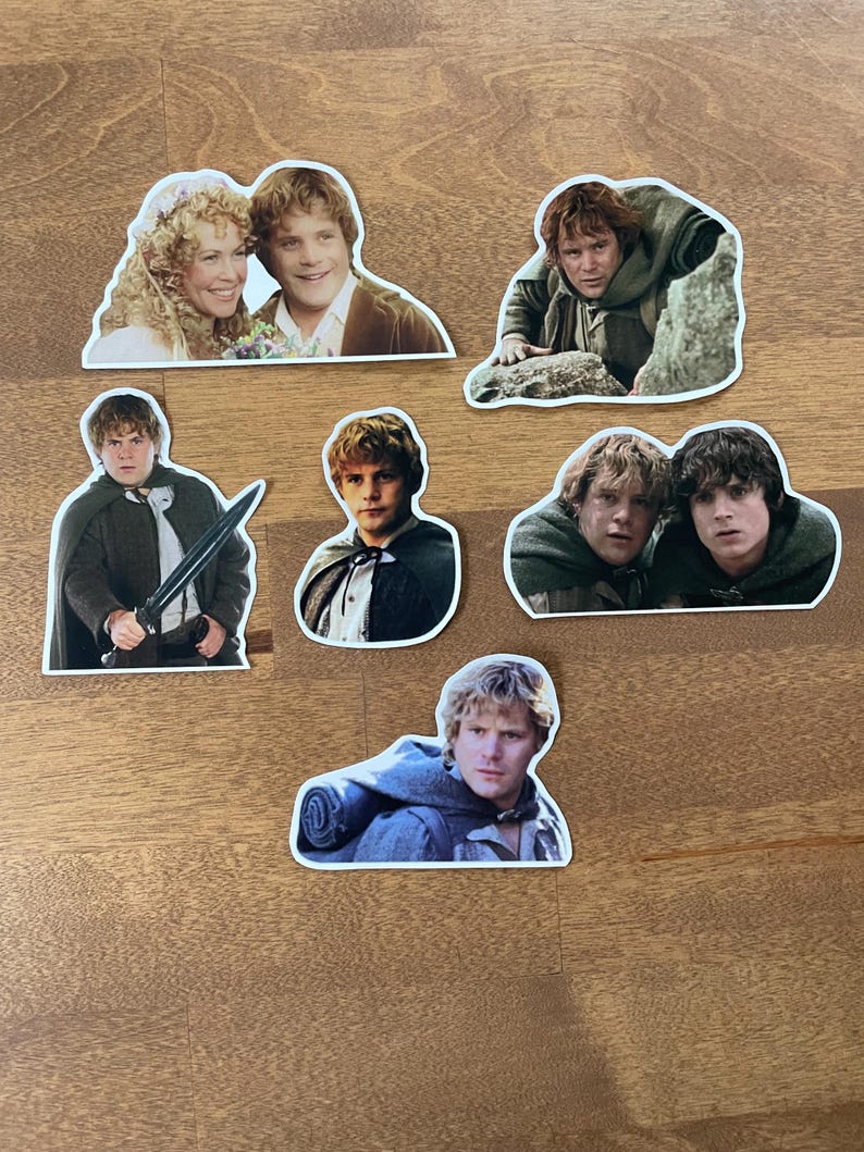 May include: A set of seven stickers featuring various images of a character from the Lord of the Rings movie franchise. The stickers are printed on white paper with a glossy finish.