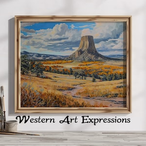 May include: A framed painting of a landscape with a large rock formation in the distance. The sky is blue with white clouds. The foreground is a field of grass with trees and a dirt path.