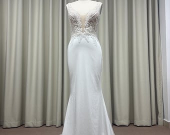 Custom Satin Sheath Wedding Dress with Plunging V-Neck and Lace Appliqué | Elegant Bridal Gown with Chapel Train