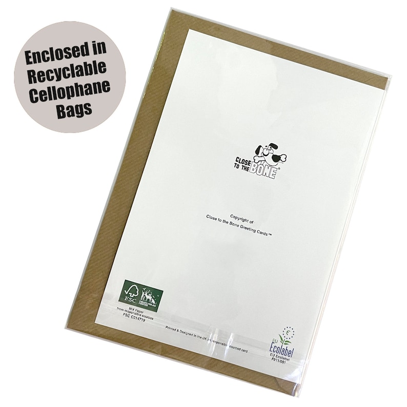 May include: A greeting card in a cellophane bag. The card features the text "CLOSE TO THE BONE" with a dog illustration. The packaging includes the text "Enclosed in Recyclable Cellophane Bags". The card is in a brown envelope.