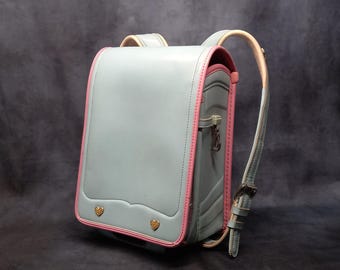 Randoseru Backpack, Light Blue with Pink Trim Japanese Tight Stitch Randoseru Bag, Blue Japanese School Bag - Oliver Enfants