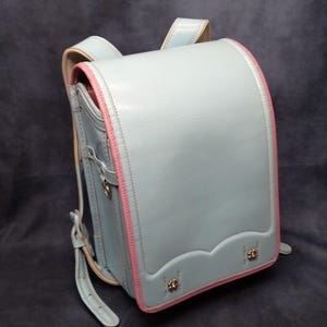 Sac à dos Randoseru, bleu clair avec bordure rose Sac Randoseru japonais à coutures serrées, cartable japonais bleu