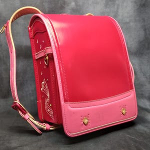 Sac à dos Randoseru, rouge avec bordure rose Sac Randoseru japonais à coutures serrées, cartable rouge japonais - Love Pea