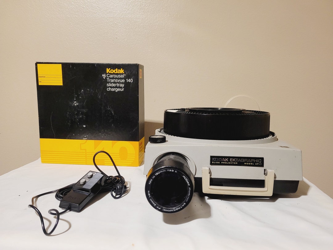 Kodak Ektagraphic AF1 Slide Projector 100150mm Zoom Lens New Solenoid