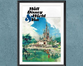 May include: Framed print featuring a vintage Walt Disney World poster. The artwork showcases Cinderella's castle, a crowd of people, and the text "Walt Disney World & You". The print is in a black frame.