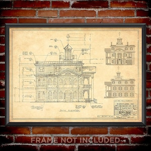 May include: A framed architectural blueprint on aged paper featuring the South Elevation of the Haunted House at Disneyland. The technical drawing includes detailed line work, structural annotations, and a title block labeled Disneyland, Inc.